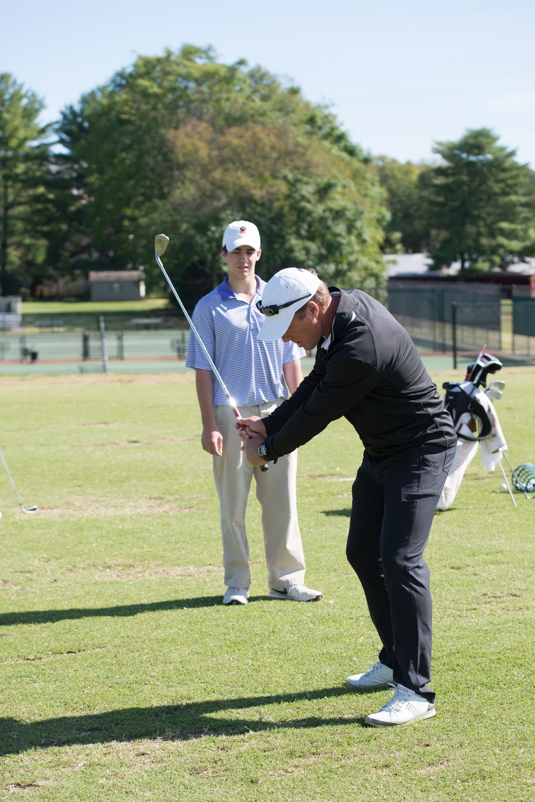 Woodberry Forest Golf Andrew Rice works with fall golfers
