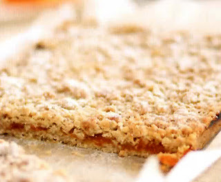 Apricot and Oat Crumble Slice: Thin oat biscuits sandwiching an apricot filling. A classic treat for tea-time or to go with coffee