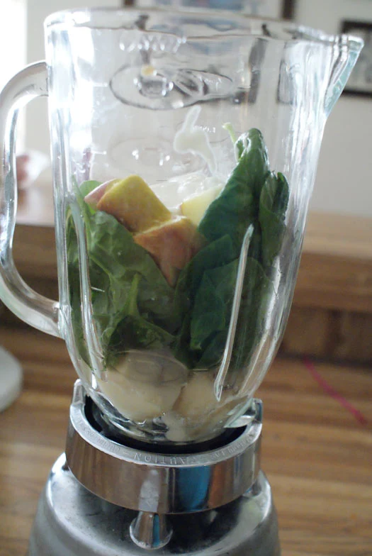 Green Protein Smoothie made with apples, bananas, spinach and greek yogurt.