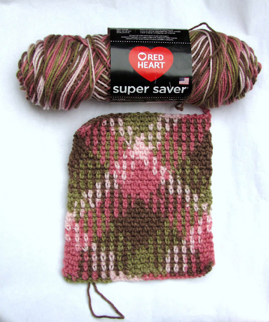 Tamdoll tries Planned Pooling with crochet and Red Heart Yarn in Pink Camo.