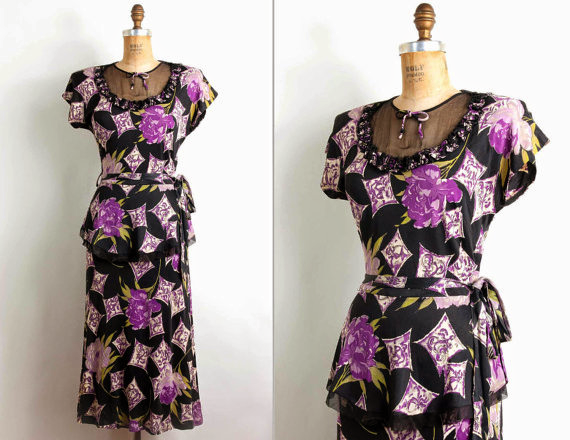 Mint condition 1940s peplum dress with novelty print