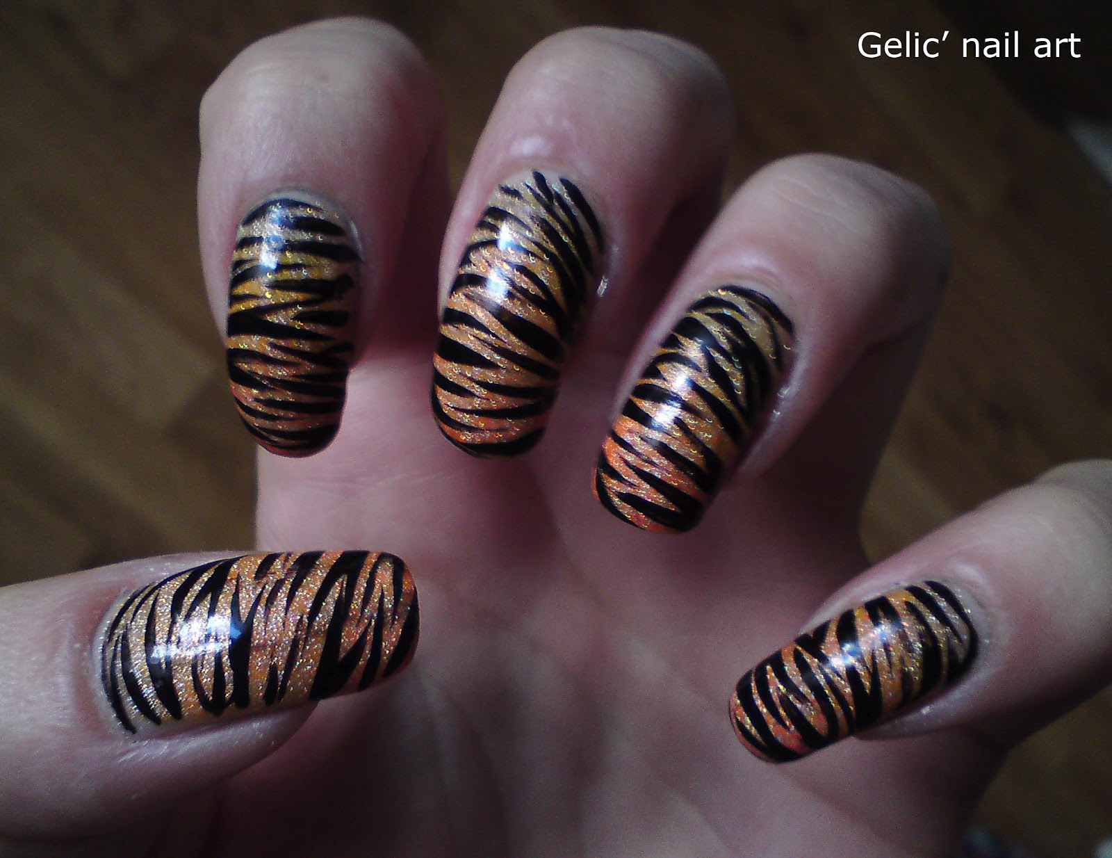 Tiger nail design in gold - wide 2