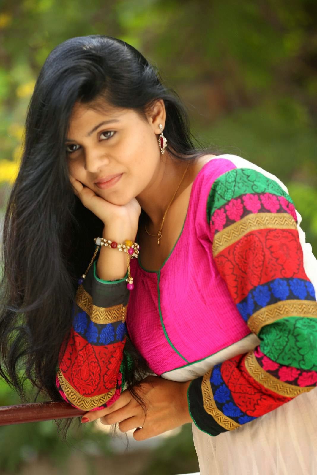 Nairuthi Photo Shoot Stills in White Dress Glamsham Photos