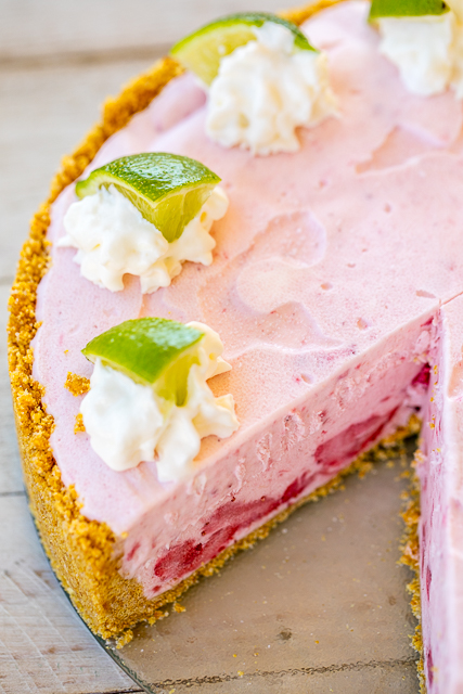 Frozen Strawberry Margarita Pie - seriously delicious!!! No-bake! Graham cracker crumbs, sugar, butter, sweetened condensed milk, margarita mix, frozen strawberries and whipped cream. Ready to freeze in about 5 minutes. SO easy and SOO good! Great way to beat the heat this summer! #dessert #nobake #frozendessert #margarita Frozen Strawberry Margarita Pie - seriously delicious!!! No-bake! Graham cracker crumbs, sugar, butter, sweetened condensed milk, margarita mix, frozen strawberries and whipped cream. Ready to freeze in about 5 minutes. SO easy and SOO good! Great way to beat the heat this summer! #dessert #nobake #frozendessert #margarita