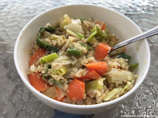 healthy buddha bowl with leek and carrots