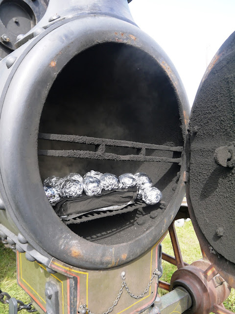 Baked potatoes in a steam engine