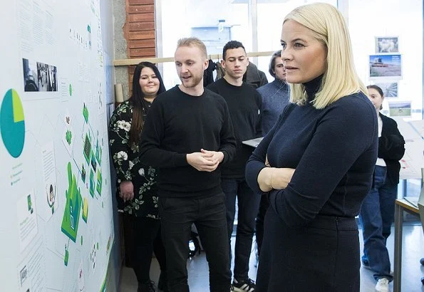 Crown Princess Mette-Marit of Norway visited the Oslo School of Architecture and Design. Princess Prada boots and Stella McCartney wool coat