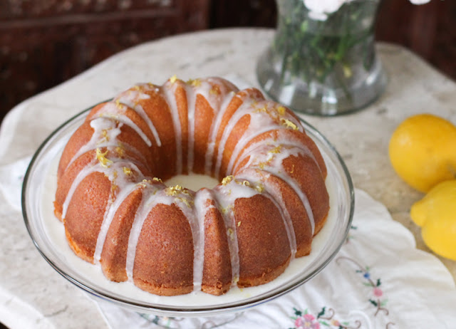 Food Lust People Love: Pound cake is one of the most dependable cakes you can make for any party or occasion. It’s simple but elegant and everybody likes it, especially if it’s as moist and lemony as this one is. The bright as sunshine taste of lemon with the additional tang of yogurt makes this traditional lemon drizzle pound cake a constant favorite.