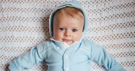 with an i.e.: A vintage baby outfit