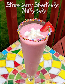Strawberry Shortcake Milkshakes, bursting with flavor from fresh juicy strawberries, ice cream and ice cream bars. | Recipe developed by www.BakingInATornado.com | #recipe #strawberry
