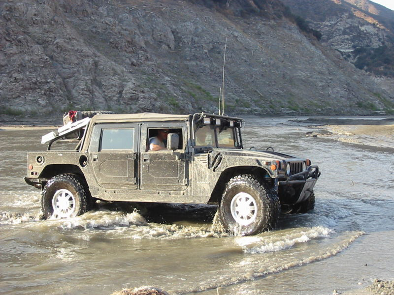 Hummer H1 Sport Utility Truck, showing its durability and power when ...