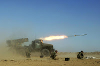 Syrian armed forces fire a missile during a live ammunitions exercise in an undisclosed location December 4, 2011