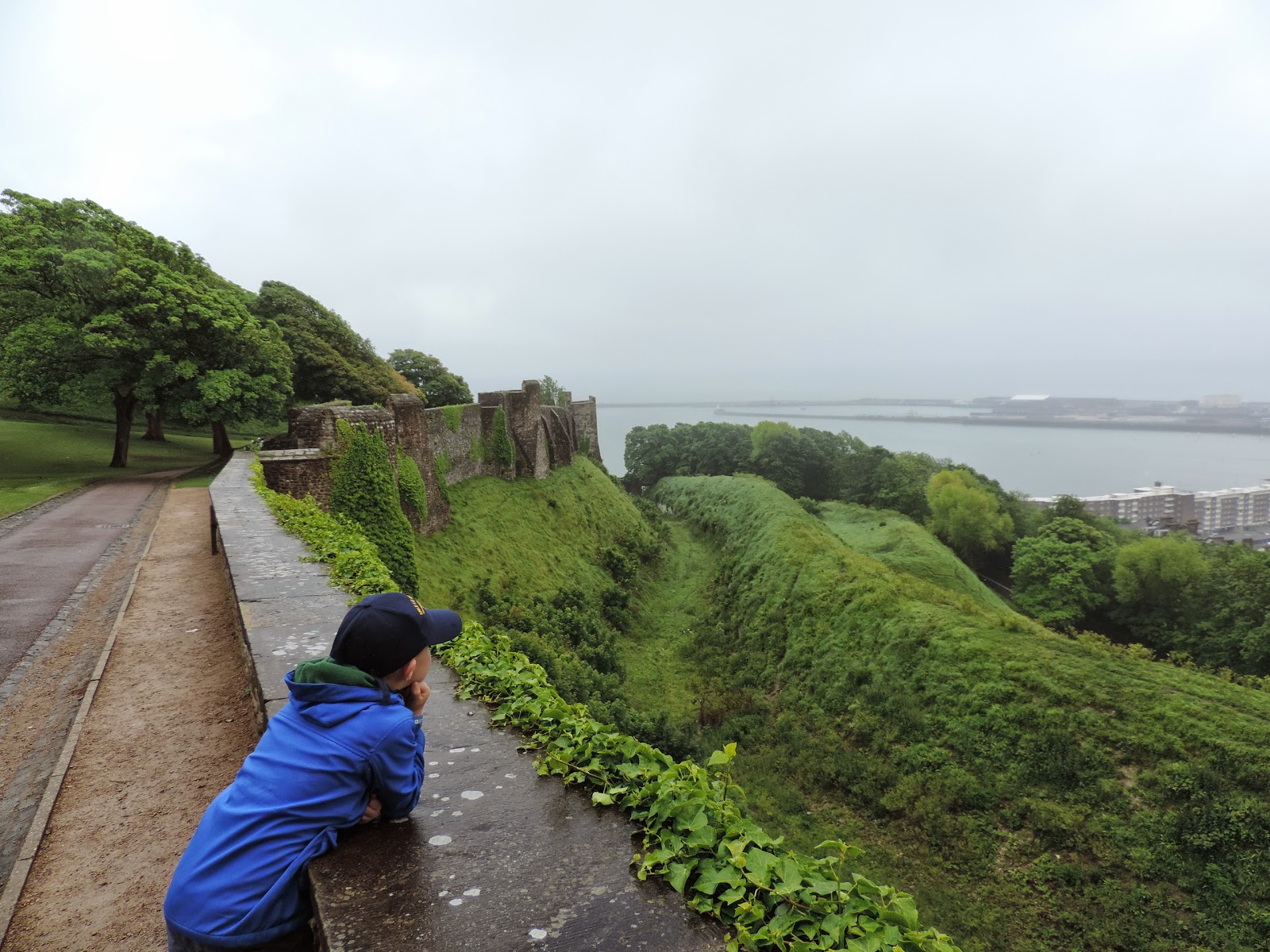 peverells gate and curtain wall with defensive towers and ramparts dover castle outer walls looking towards commercial port of dover