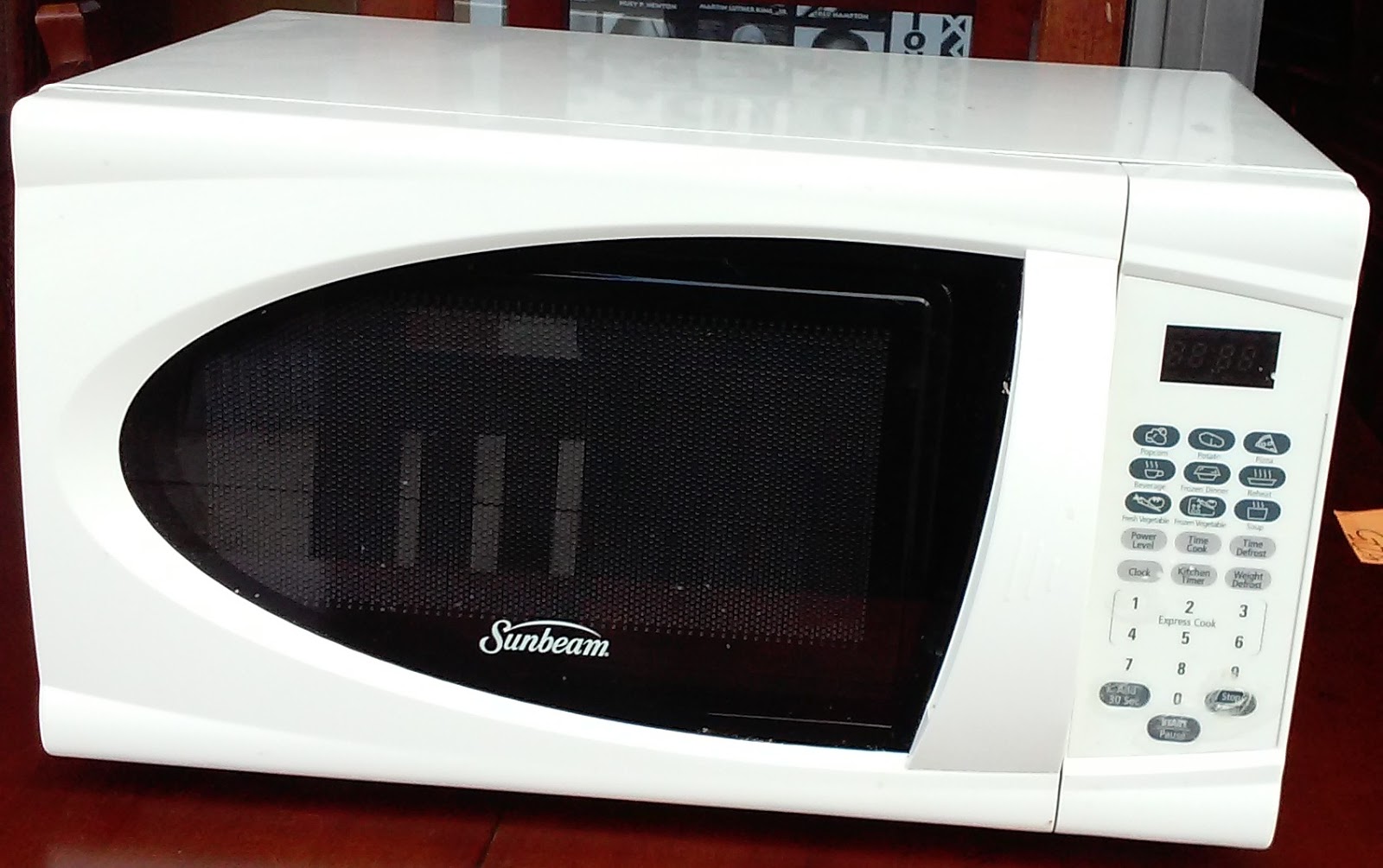 UHURU FURNITURE & COLLECTIBLES: SOLD Sunbeam Microwave with Manual - $25