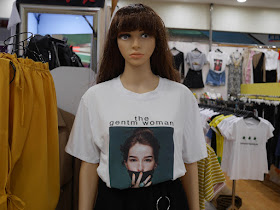 female mannequin wearing "the gentm woman" shirt