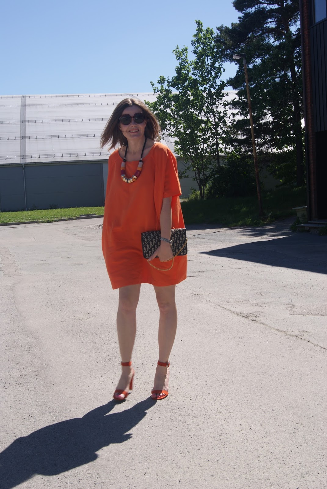 in the style orange dress