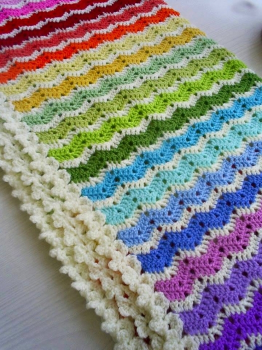 Crochet blanket. Easy to do in zig zag points on yarns patterns