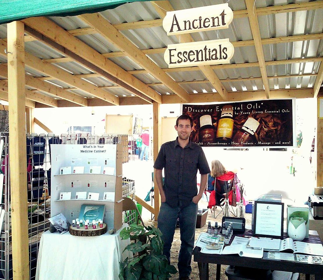 My husband at our essential oils booth.