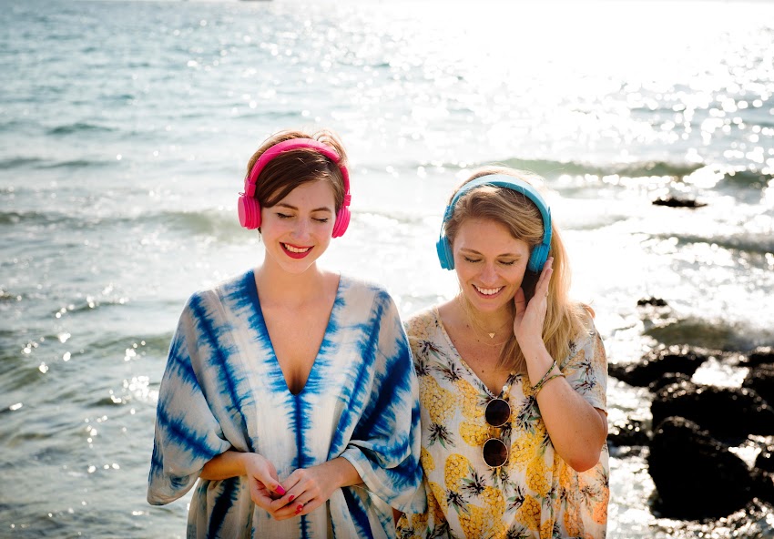 Girls With Color Headphones On Beach Girls With Color Headphones On Beach