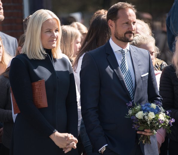 Crown Prince Haakon and Crown Princess Mette-Marit visited Risør in connection with celebrations of 50th anniversary of Konvoibyen. Prada