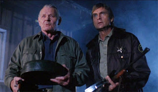 Leo Gordon and John Phillip Law in Alienator (1990)