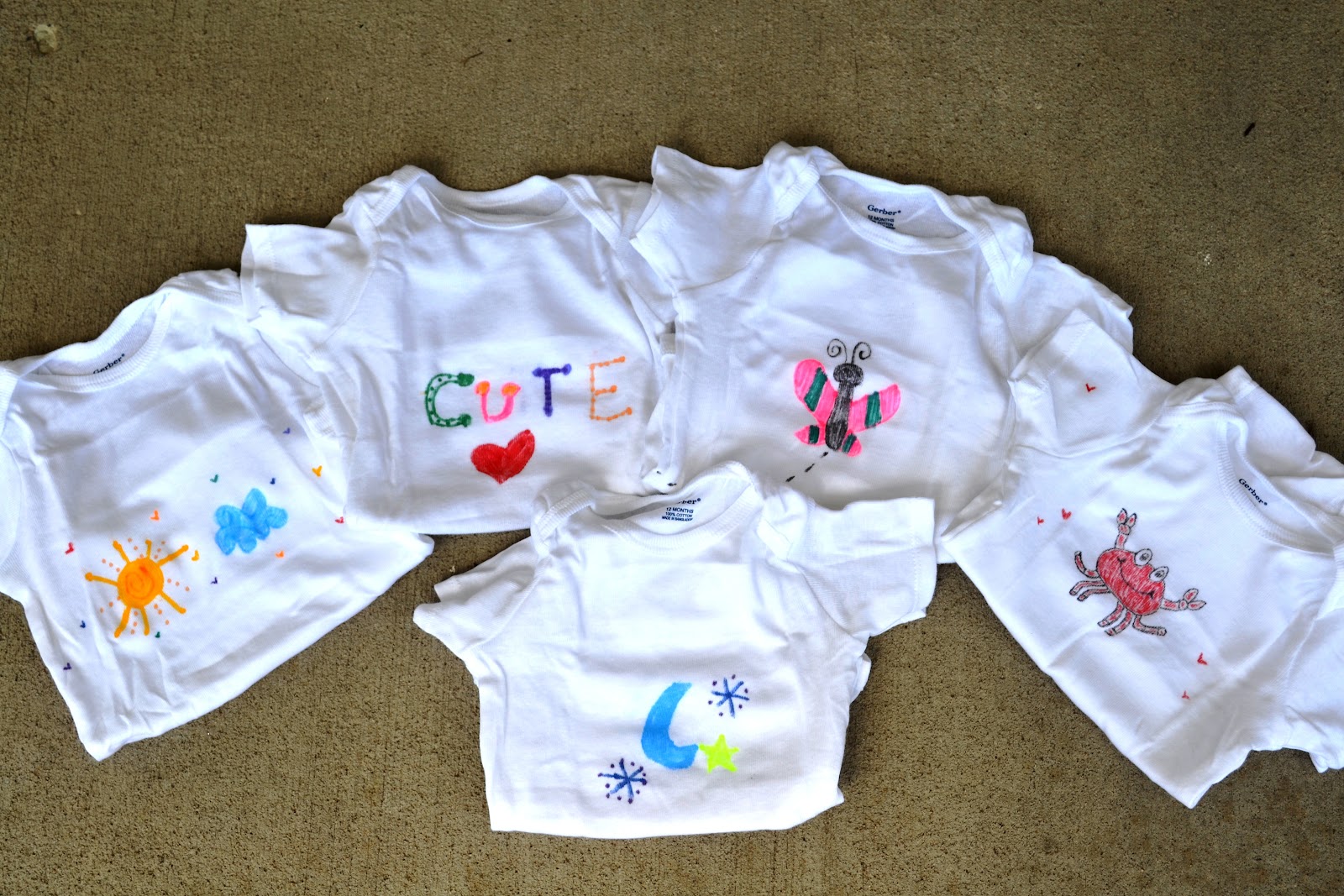 Sweetology Giving Back Fabric Marker Decorated Baby Onesies