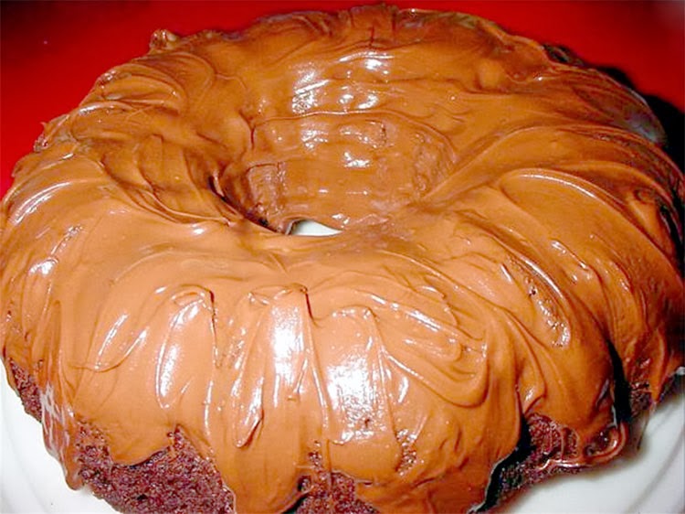 Chocolate Peanut Butter Bundt Cake: Rich chocolate cake baked as a ring to engender luck for the New Year served with a chocolate and peanut butter topping.