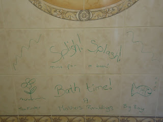  Bath Crayons on the wall to help encourage the children to help clean up