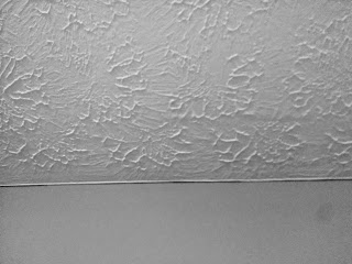 An image of textured grey ceiling 