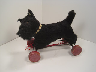steiff dog on wheels