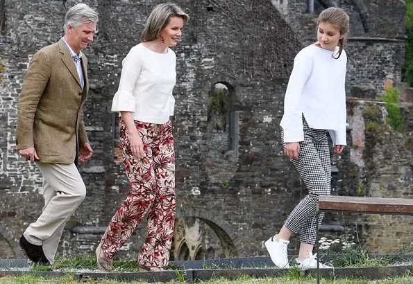 Queen Mathilde wore Dries Van Noten trousers, white bell Sleeve Stretch Crepe Top. Crown Princess Elisabeth and Princess Eleonore