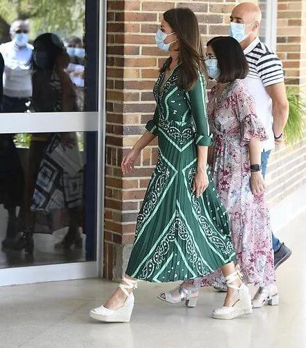 Queen Letizia wore a scarf print long dress from Sandro, and espadrille wedges from Macarena. Queen Letizia wore Sandro long dress