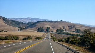 Road with rolling hills.