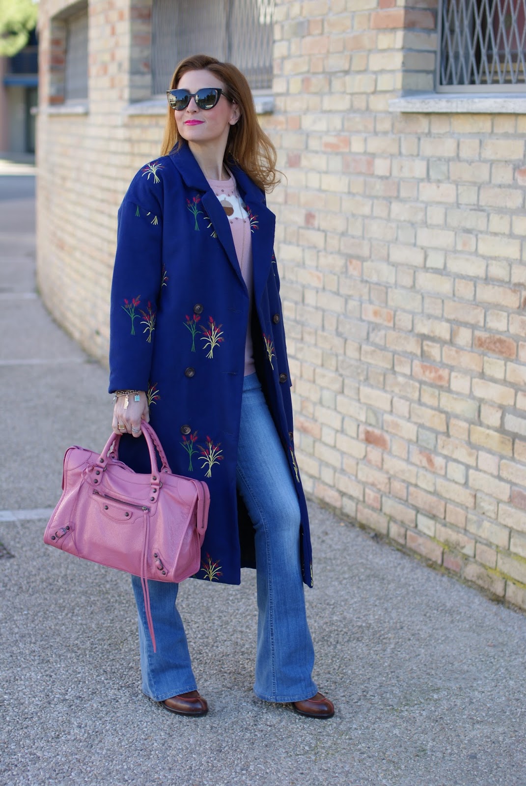 How to wear flare denim pants, a 70's inspired outfit with floral embroidered Zaful coat on Fashion and Cookies fashion blog, fashion blogger style