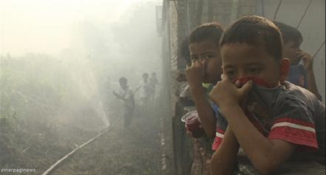 TEKS EKSPOSISI &quot;DAMPAK KABUT ASAP TERHADAP EKONOMI&quot;