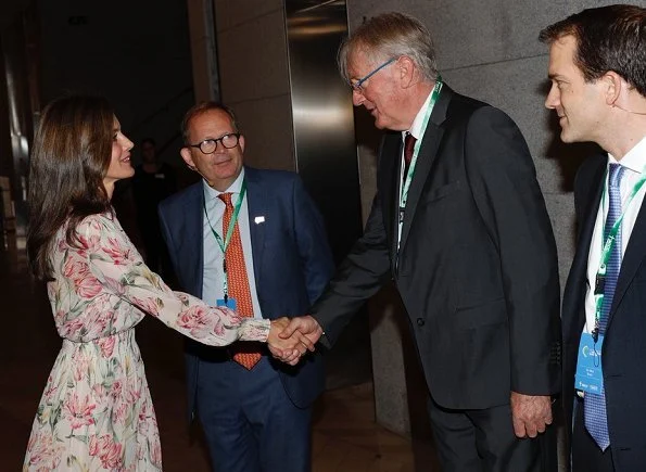 Queen Letizia wore Zara printed dress, Coolook Jewelry Sila earrings and carried Adolfo Dominguez clutch