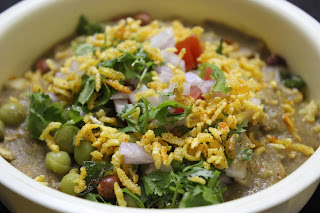 popular street food made from puri, peas and a spicy gravy