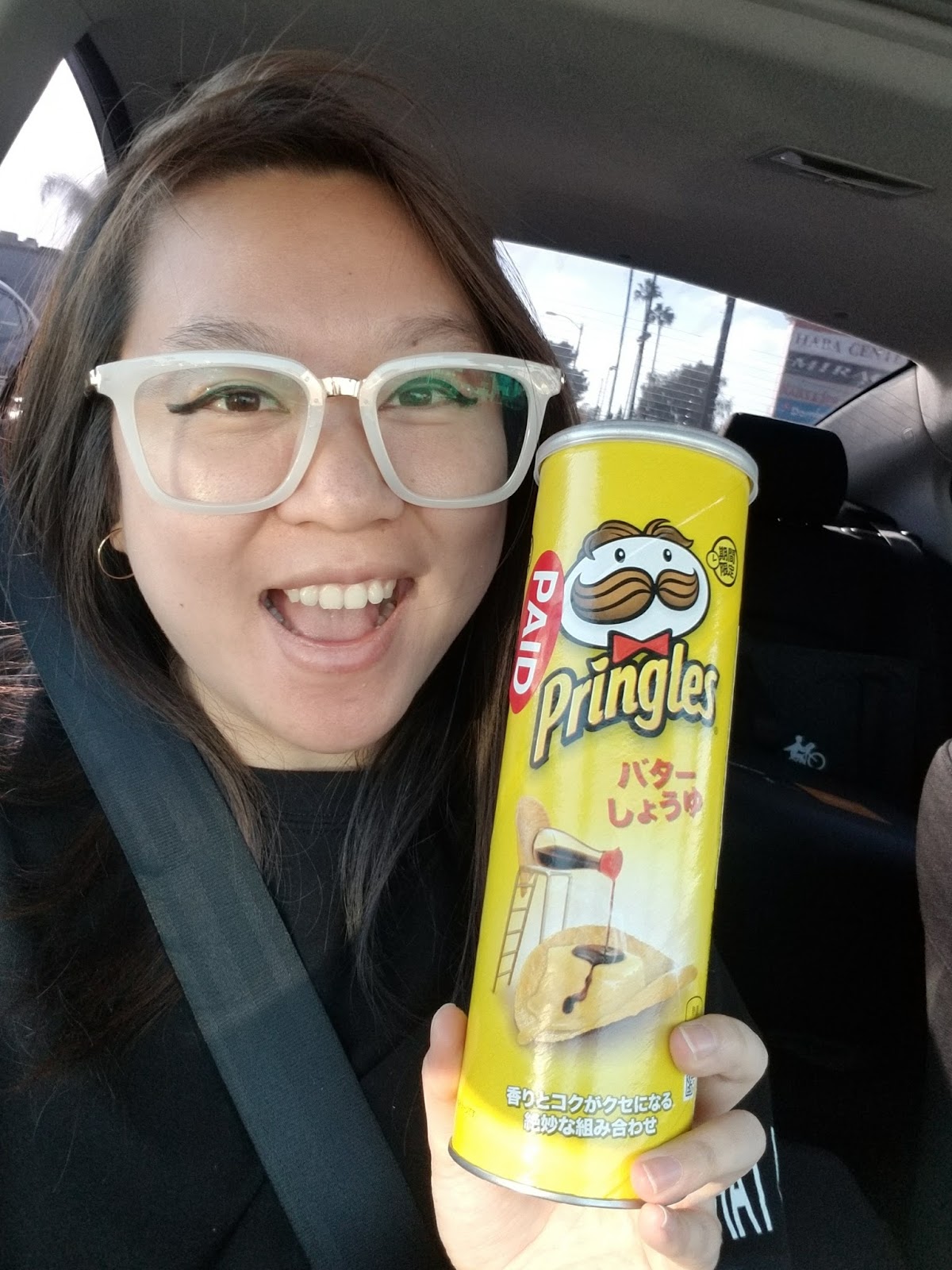 Munching on Japanese Pringles Butter Soy Sauce Chips!