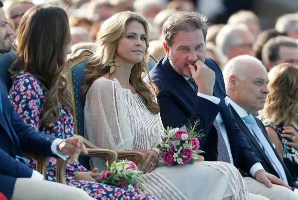 Princess Madeleine wore RED Valentino Natural Pleated Tulle Floral Print Midi Dress and Princess Sofia wore & Other Stories Tie Frill Dress. Princess Estelle