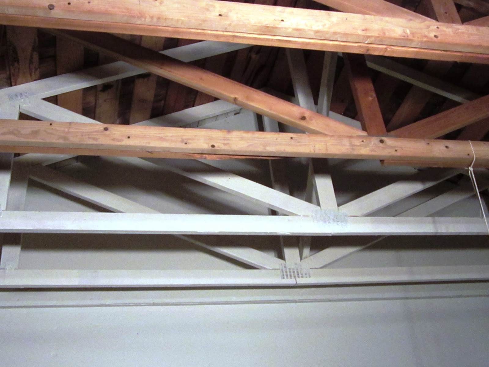 DIY Dithering Painting garage trusses and shingles Definitely the