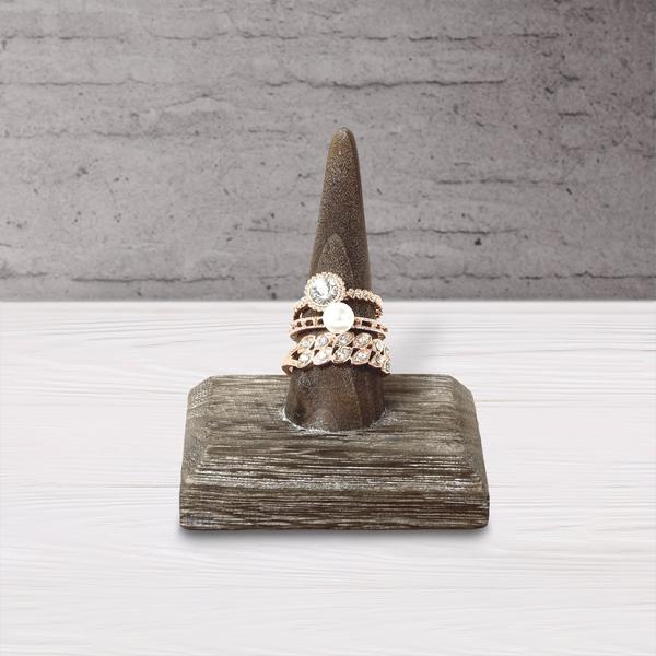 Looking for a wooden finger single ring holder jewelry display stand for the perfect spring collection display.