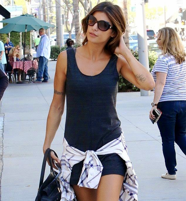 Elisabetta Canalis proves her beauty in a Mini Dress as she walks alone