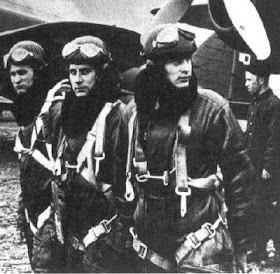WW2 Polish Pilots (background is famous the PZL 37 Los Polish bomber )