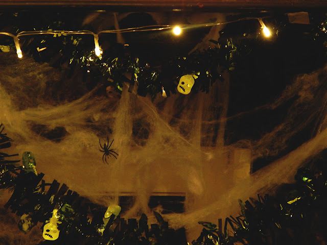 Fake cobwebs, tinsel, and lights.