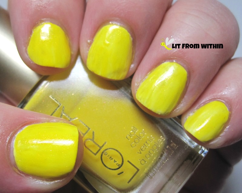 L'Oreal Tweet Me, a yellow jelly with orange shimmer (over white)