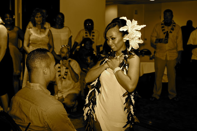 Filipino bride dancing for her husband at their wedding reception in Hawaii