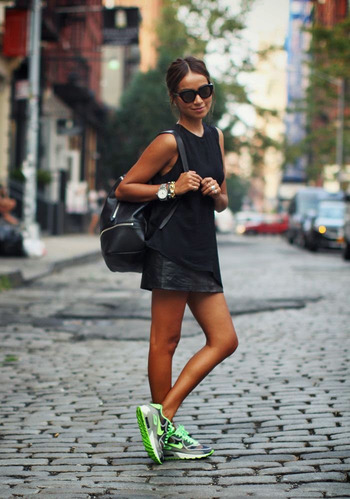 Street style | Black top, edgy black leather skirt, neon sneakers ...