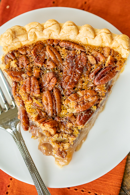 Maple Pecan Pie - seriously delicious!!! SO much amazing flavor from the real maple syrup! Super easy to make! Pie crust, sugar, maple syrup, butter, eggs, pecans, vanilla. Make the day before. Serve with vanilla ice cream and caramel sauce! YUM! #pie #dessert #thanksgiving #christmas #pecanpie #maplesyrup Maple Pecan Pie - seriously delicious!!! SO much amazing flavor from the real maple syrup! Super easy to make! Pie crust, sugar, maple syrup, butter, eggs, pecans, vanilla. Make the day before. Serve with vanilla ice cream and caramel sauce! YUM! #pie #dessert #thanksgiving #christmas #pecanpie #maplesyrup