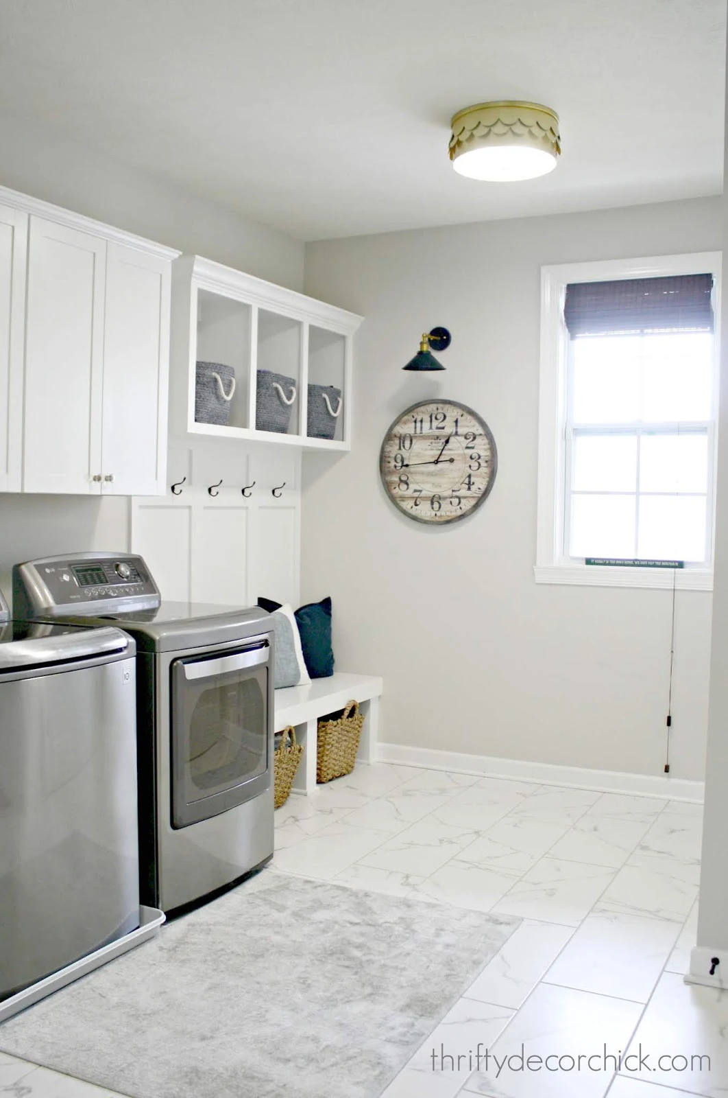 Laundry and mud room combination in white and gray
