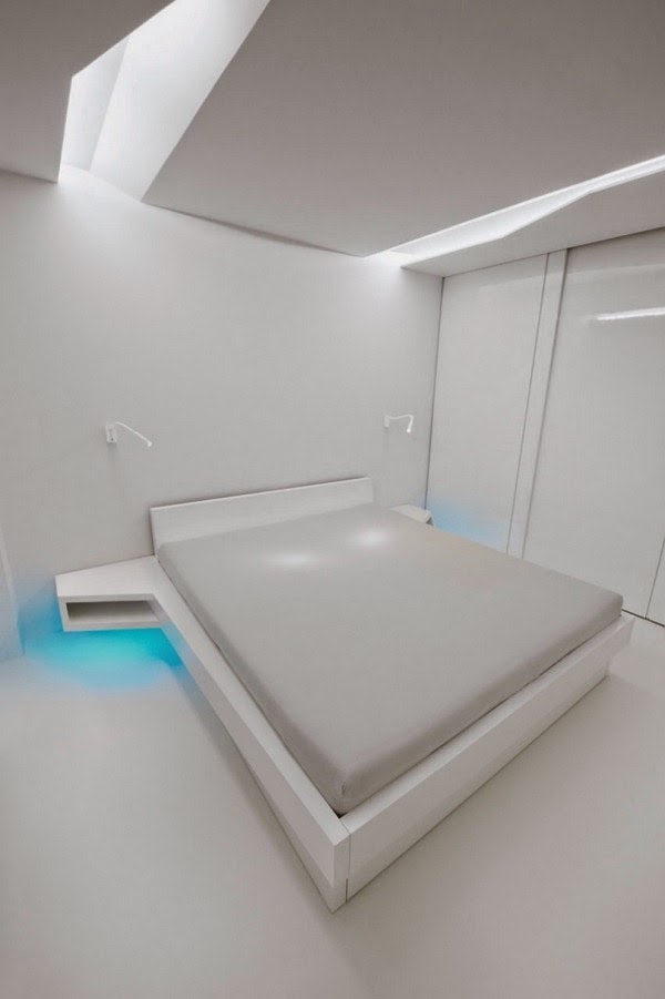 Renovated white apartment with futuristic interior design